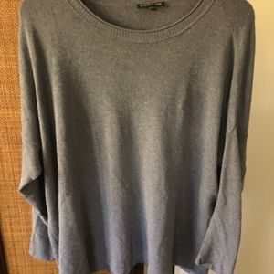 Very soft and comfy, charcoal gray sweater .
